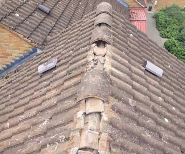 This is a photo if a roof ridge which has missing tiles. The ridge tiles are being replaced by GKL Roofing Tickhill